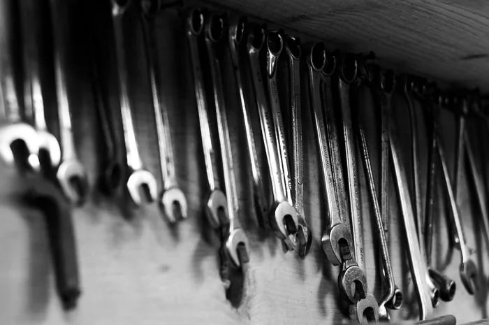 wrenches hanging in a row